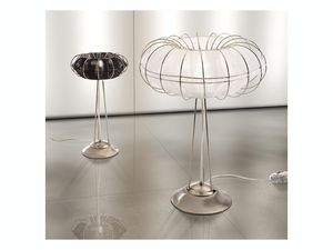 Moon table lamp, Lmpara de mesa con lneas limpias y minimalistas